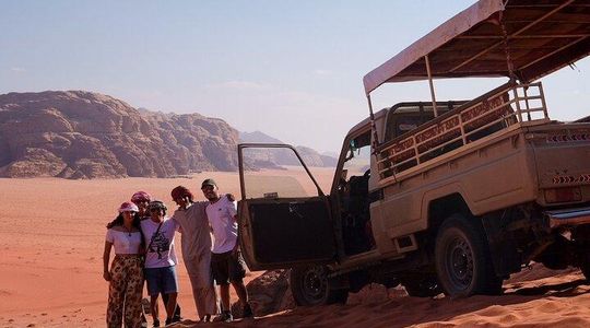 Wadi Rum Half-day Jeep Tour incl. sandboard, water & Bedouin tea