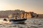 Aperitif on a boat at sunset in the Gulf of Naples