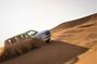 Dubai Red Dunes with Sandboarding, Camel Ride, Falcon & VIP Camp