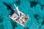 "Isla Mujeres en Catamaran All Inclusive + Free Transportation"