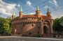 A glance at the Krakow Old Town from the deck of a electric golf cart