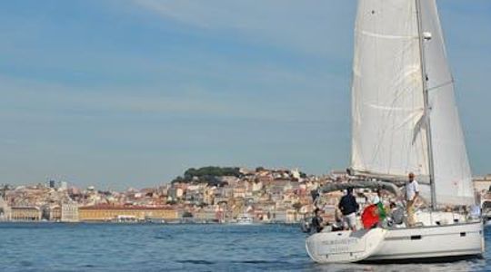 Lisbon old town sailing cruise with a welcome drink