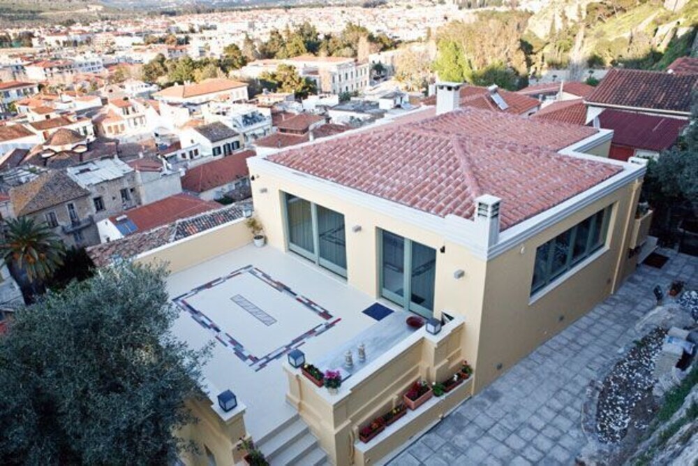 Experience the charm of Nafplio at Amfitriti Palazzo, a cozy guest house with modern comforts, just steps from local attractions and beaches.