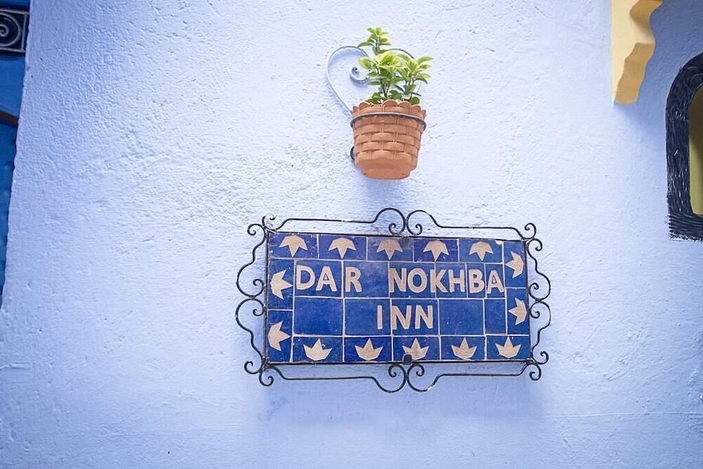 Experience the charm of Chefchaouen at Dar Nokhba Inn, a cozy retreat with modern amenities, perfect for adventure seekers and relaxation lovers.