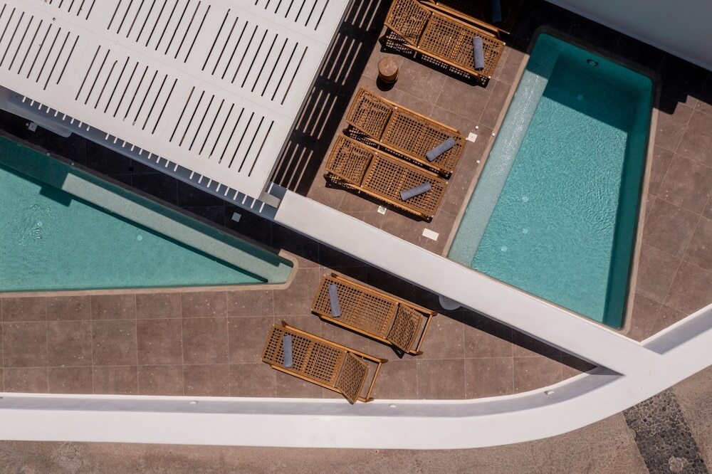 Discover the beauty of Santorini at Victoria Caves, a charming hotel in Fira, offering comfort and convenience just minutes from top attractions.