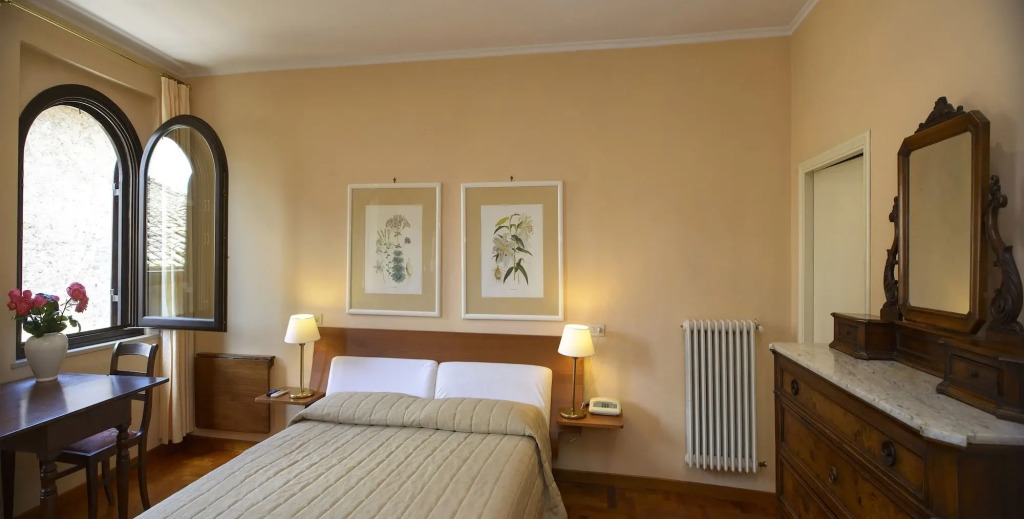 Discover the charm of San Gimignano at Hotel Bel Soggiorno, a cozy 3-star haven with modern amenities, perfect for exploring the city's historical beauty.