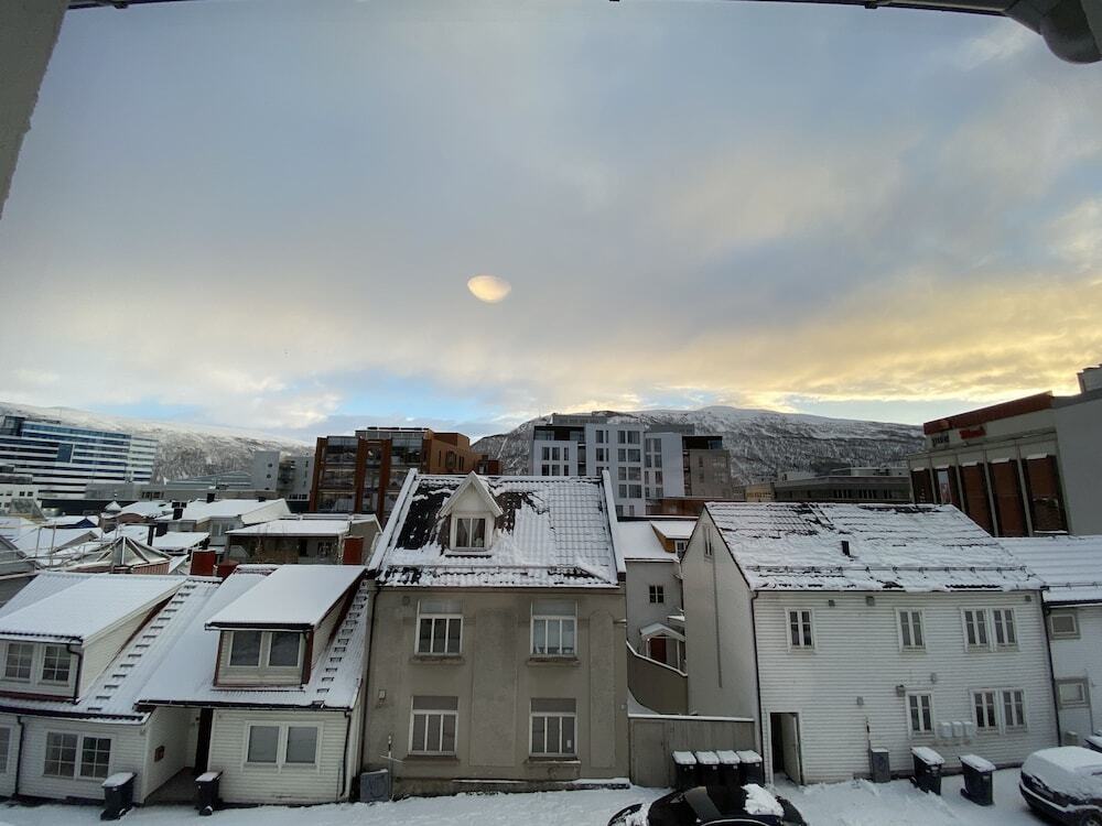 Experience the heart of Tromsø at Enter Viking Hotel, a cozy and convenient base for your Arctic adventures, offering comfort and accessibility.